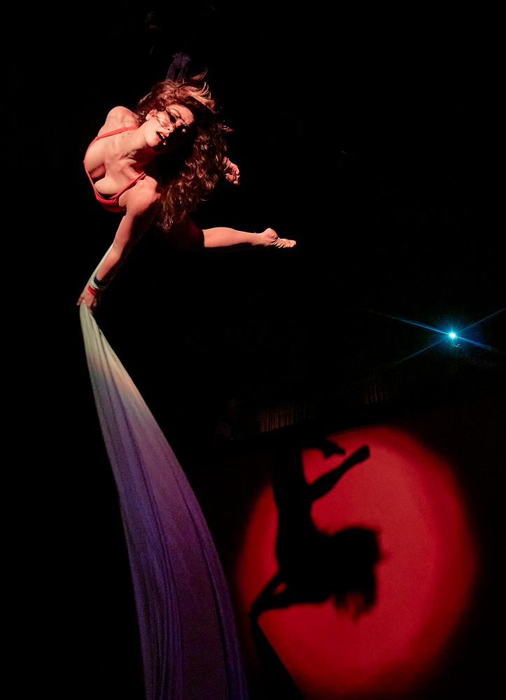 top view of woman on aerial silks