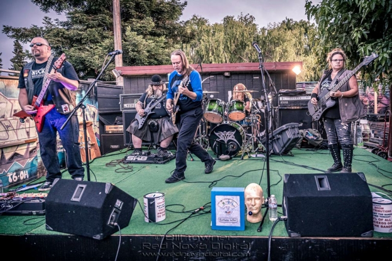 the band plays on stage