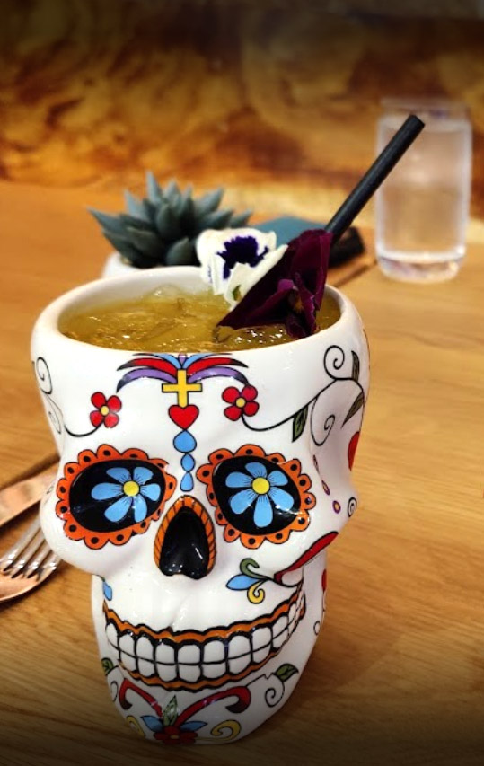 cocktail in skull cup