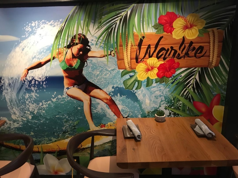 mural of surfer Warike restaurant