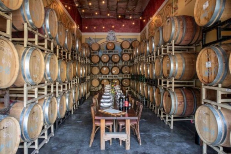 DArgenzio table set among wine barrels