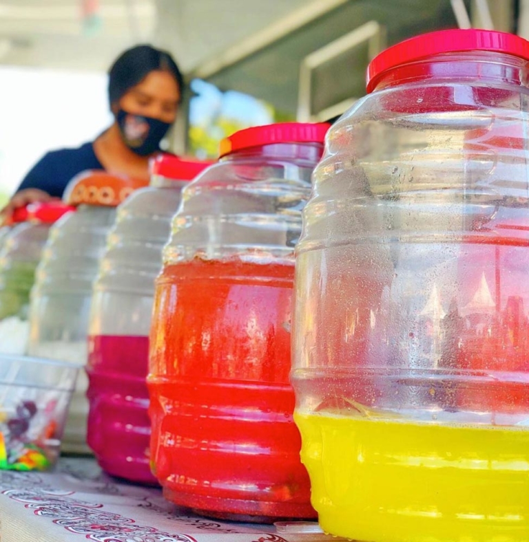 Lucha Sabina colorful jars of beverages