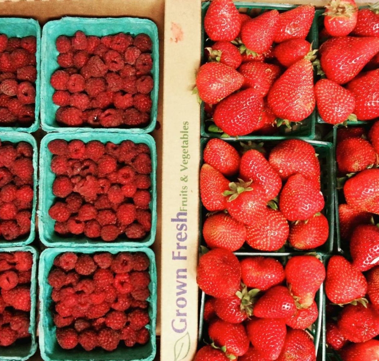 top view raspberries and strawberries