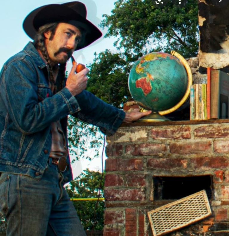 Kevin Carducci with globe