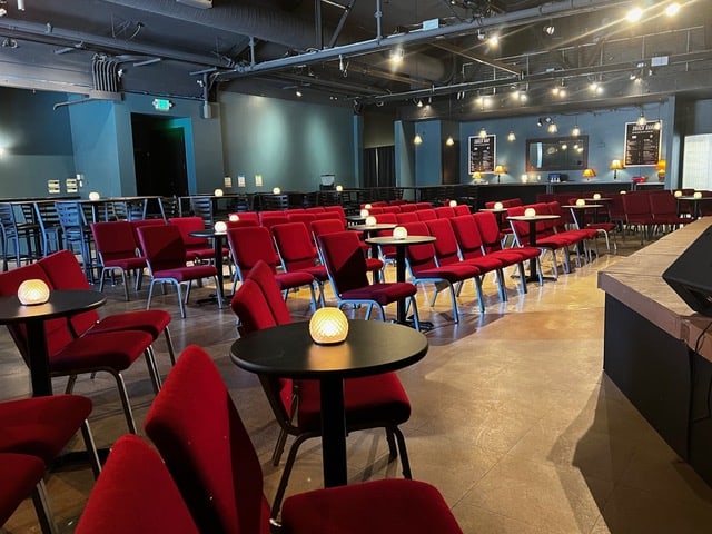 The California Interior with red chairs